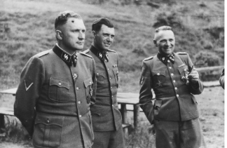 **Image of Josef Mengele between two other Nazi officials**
