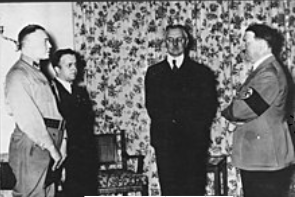 **Schacht and Hitler (rightmost) in 1936**