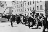 **(lef)Image of Jews rounded up in Mlaw (right) Jews in Krakow**-
