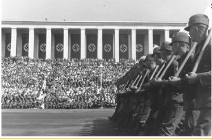 **Unit of the DAF (Deutsche Arbeitsfront) marching with shovels at a rally in Nuremberg, in** 1937