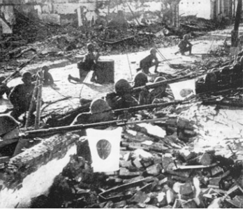 _**Japanese troops in the ruins of Shanghai**_