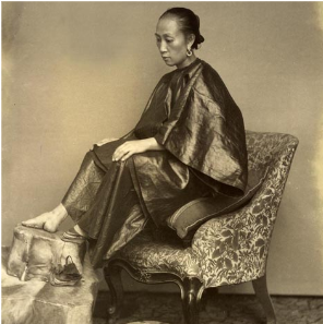 _**A Chinese woman showing her lotus foot**_