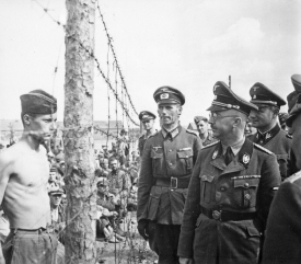 **SS leader, Himmler inspecting a Soviet prisoner of war, 1941**